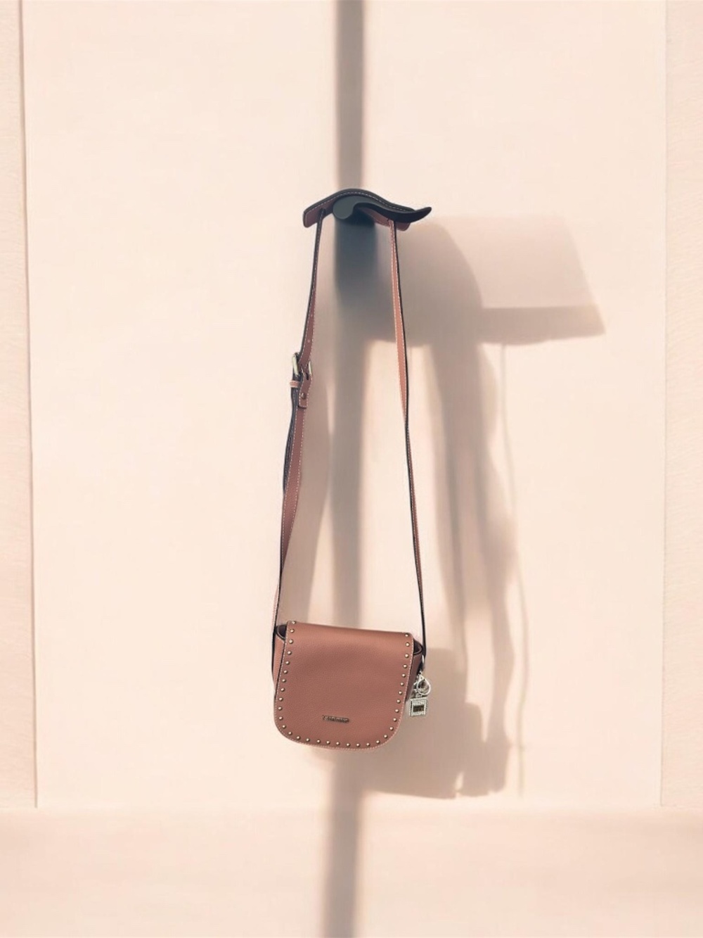 Valentino Blush Pink Crossbody Bag with Stud Accents and bag charm